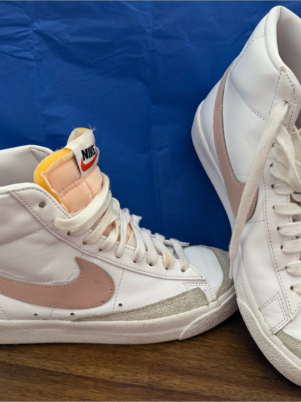 Nike Women's White High-Top Sneakers with Blush Swoosh and Yellow Tongue Accent